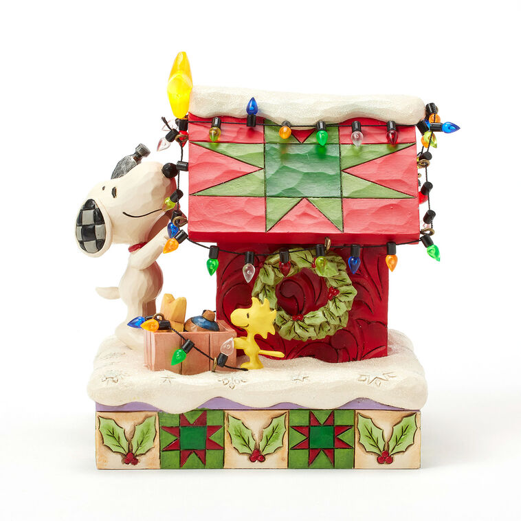 Jim Shore Peanuts Snoopy Decorating Doghouse Light-Up Figurine, 6.3"